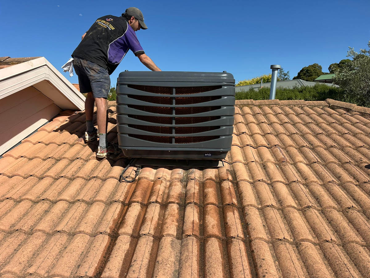 Evaporative cooler installation on a Sunbury roof